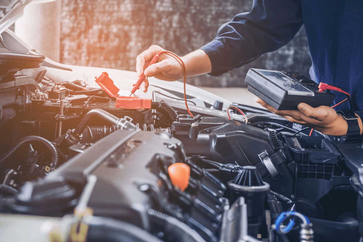Mechanic working on car